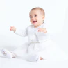 Baby girl's short white knitted bolero cardigan