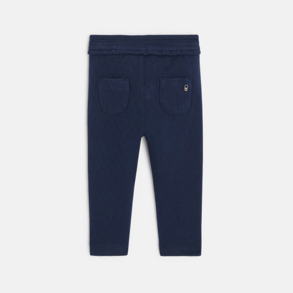 Baby girls' blue knitted trousers with elasticated waistband