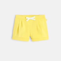 Baby girl's yellow fleece shorts with pleats