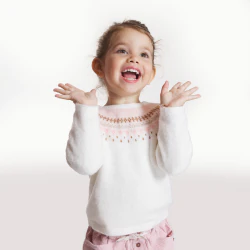 Baby girl’s pink jacquard knit sweater