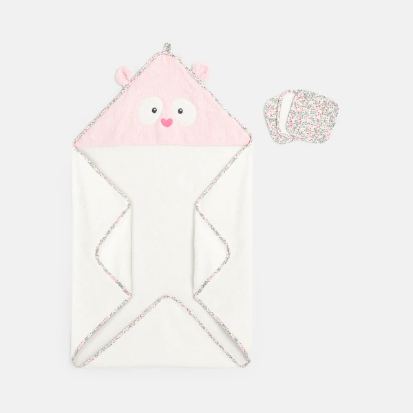 Baby girl's pink bath cape with fabric wipes