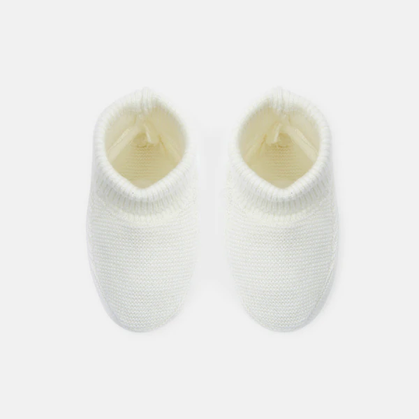 Newborn white knitted booties