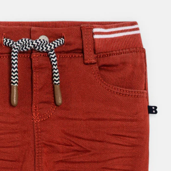 Baby boy's red denim-fabric jeans with elasticated waist