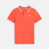 Boy's orange short-sleeve polo shirt.