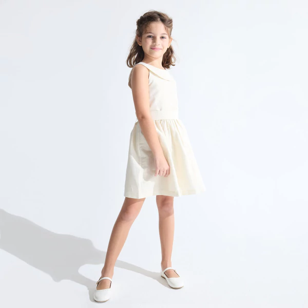 Girl's elegant golden beige sleeveless dress