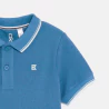 Boy's blue short-sleeve polo shirt.