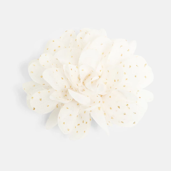 Girl's white broach/clip