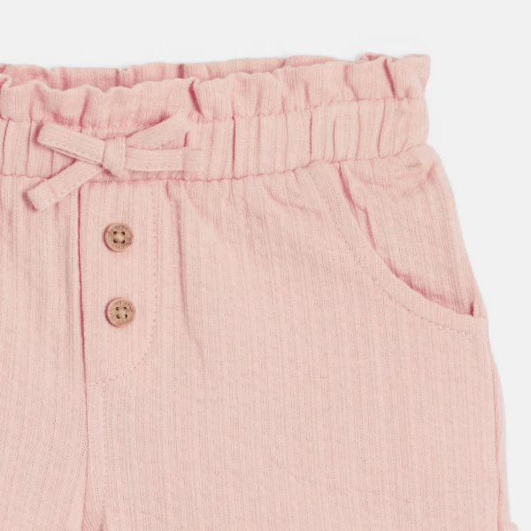 Baby girl's pink shorts in lightweight textured cotton