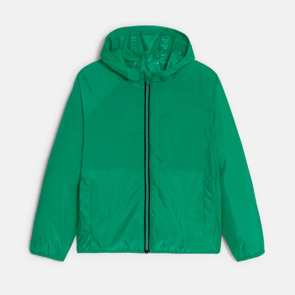 Boy's green waterproof windcheater jacket.