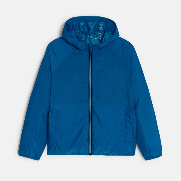 Boy's blue waterproof windcheater jacket.