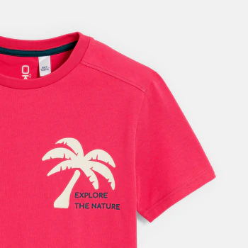 Boy's pink T-shirt with a slogan and palm tree motif on the front and back