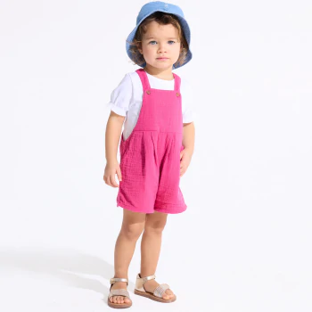 Baby girl's short pink cotton gauze dungarees