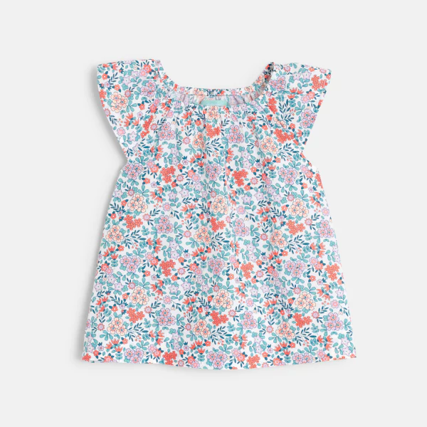 Baby girl's floral blouse and blue shorts