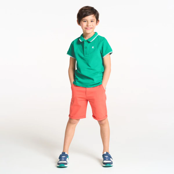 Boy's green short-sleeve polo shirt.