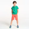 Boy's green short-sleeve polo shirt.