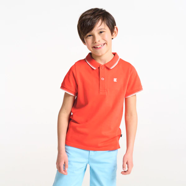 Boy's orange short-sleeve polo shirt.