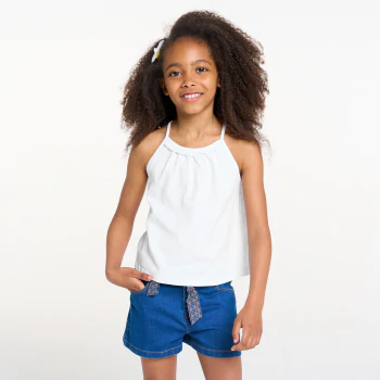 Girl's plain white vest top with crochet detail