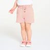 Baby girl's pink shorts in lightweight textured cotton