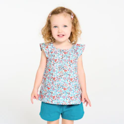 Baby girl's floral blouse and blue shorts