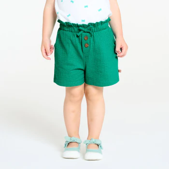 Baby girl's green shorts in lightweight textured cotton